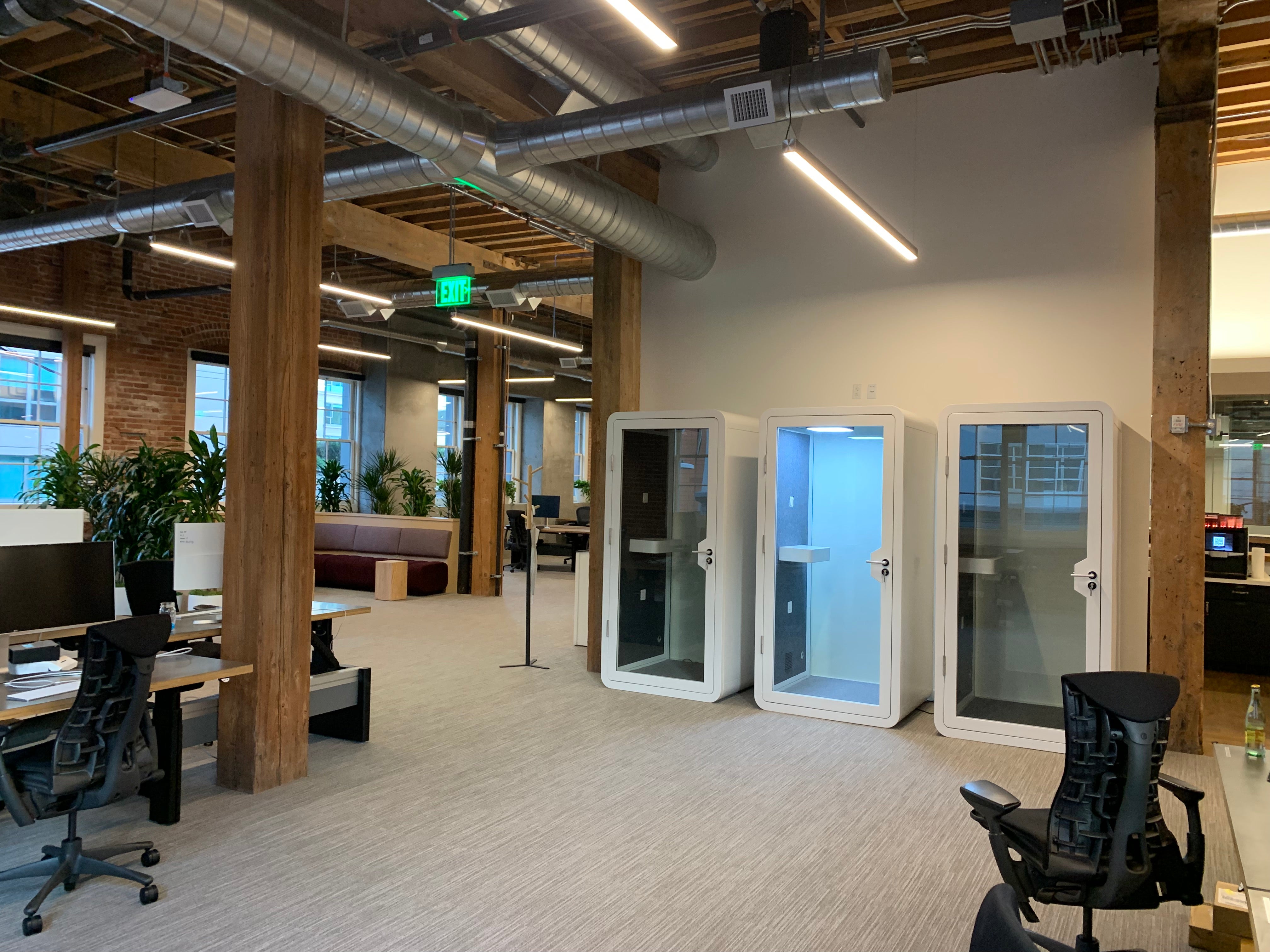 Office with privacy pod phone booths