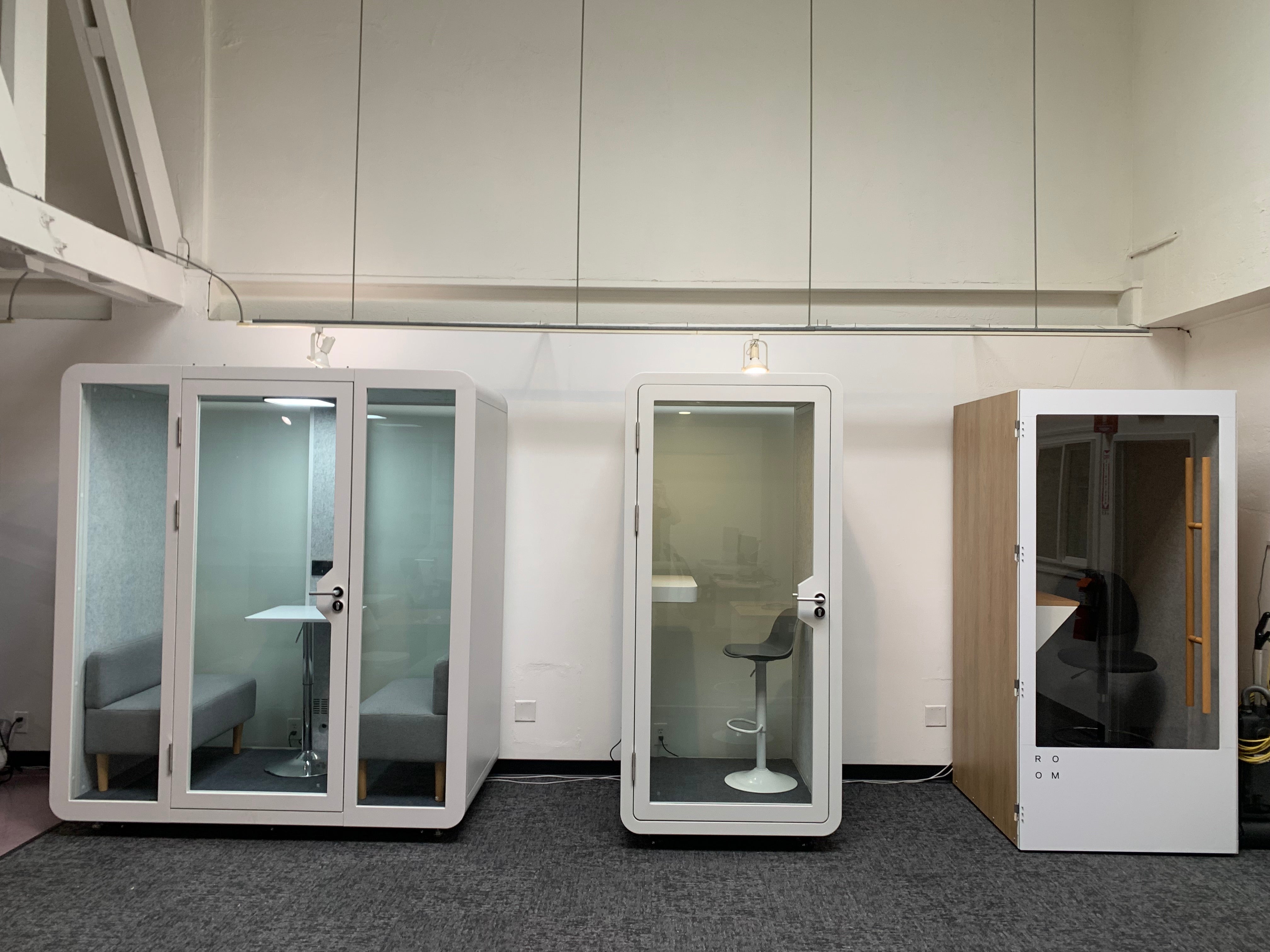 comparing office pods and office phone booths