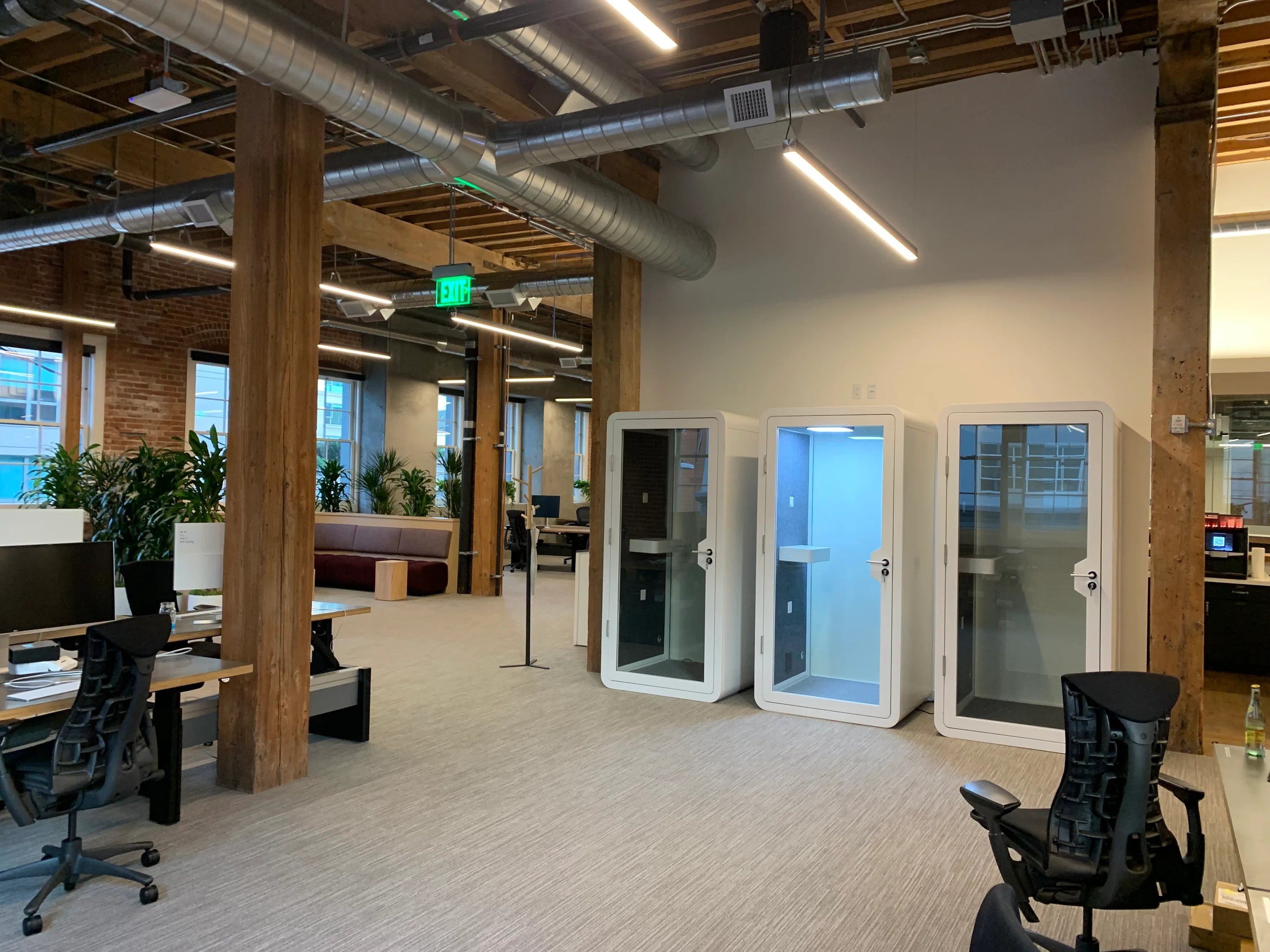 The Pros and Cons of Open Office Layouts and the Emergence of Office Phone Booths and Privacy Pods