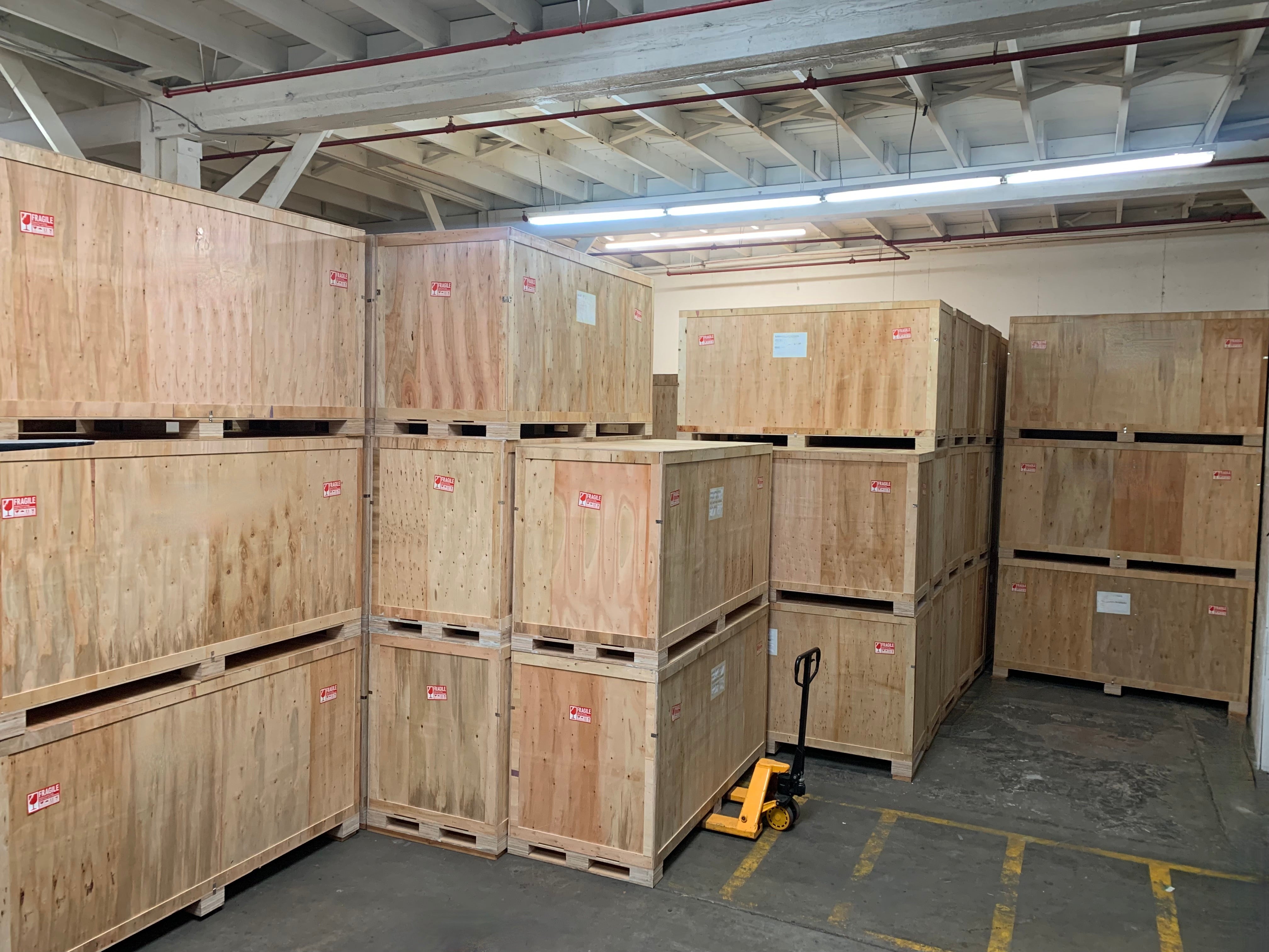 eBooth office phone booths in their shipping crates in one of our warehouses